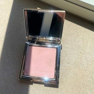 Jouer highlighter compact in shade celestial